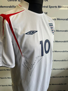 England Replica Shirt Signed front and back by Michael Owen.  Size L (Adult)