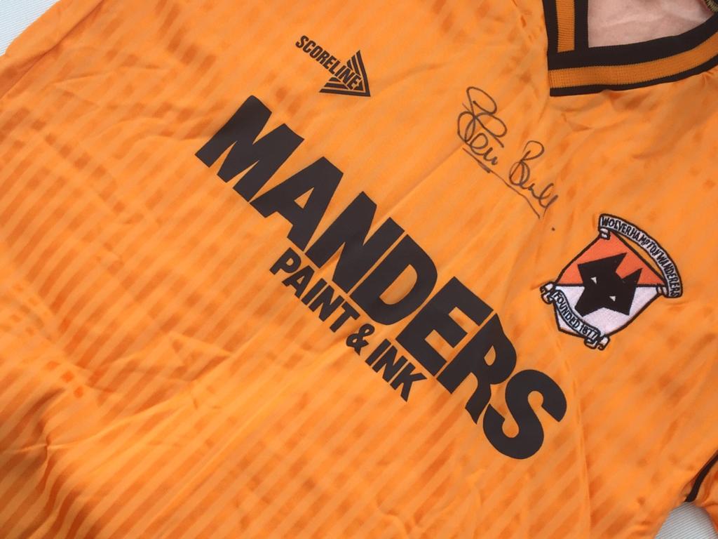 Steve Bull Signed and Framed Wolves Shirt. 1989-1990. Manders Paint and Ink Sponsor